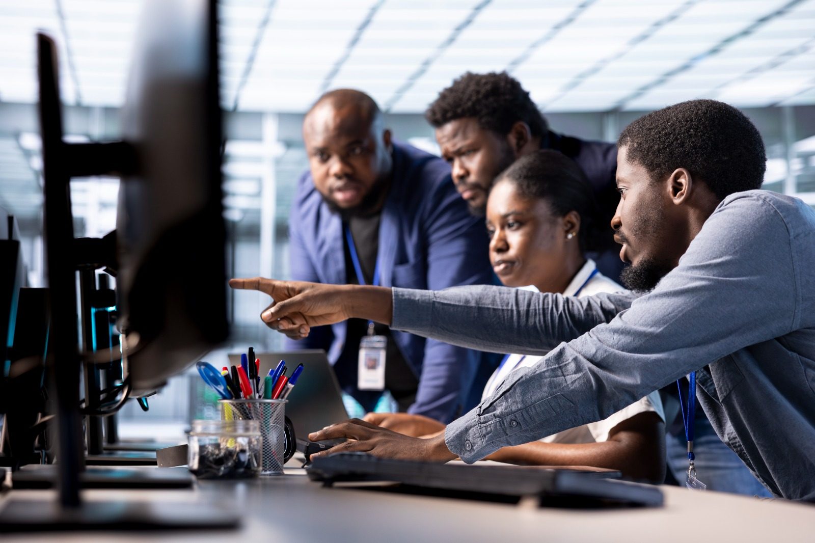 IT specialists collaborating in a modern data centre